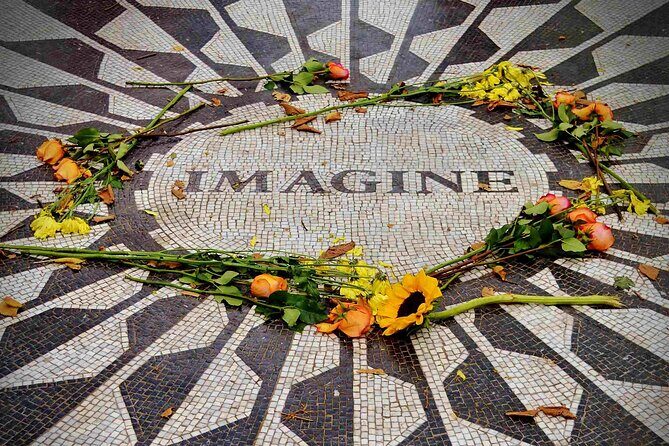 New York’s Iconic Central Park: A Self-Guided Audio Tour - Bow Bridge shadows, Strawberry Fields, and the Dakota ending